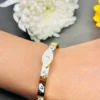 Gold Evil Eye Cuff Bracelet with White Enamel - Image 4