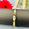 Gold Evil Eye Cuff Bracelet with White Enamel - Image 3